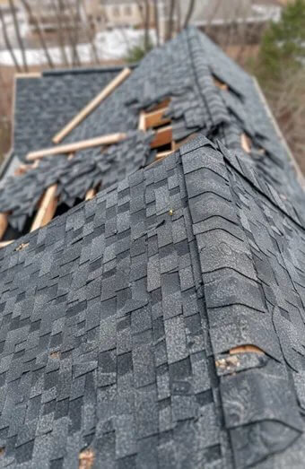 Storm Damage Roof Replacement X